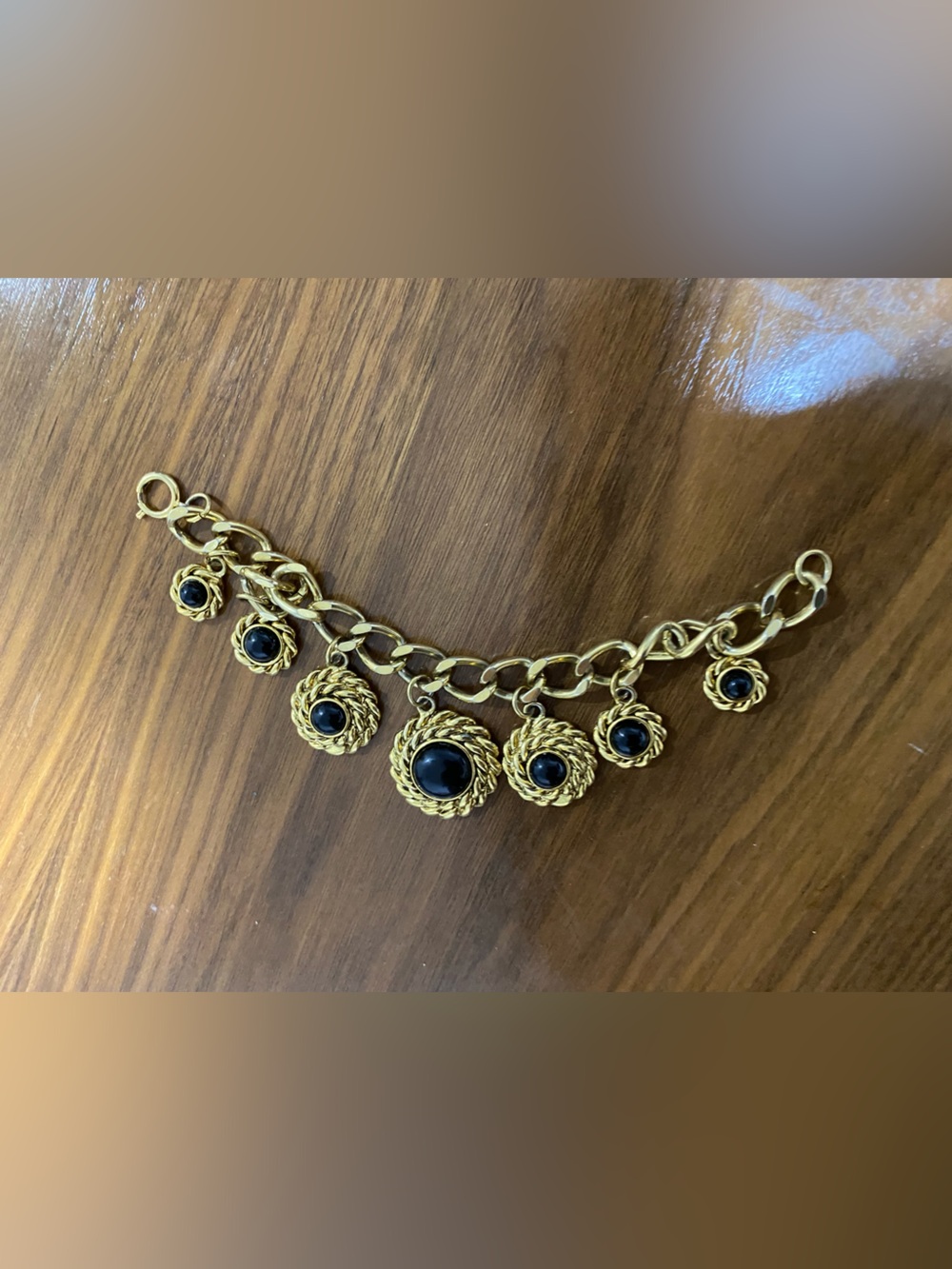Gold-Tone Chain Bracelet with Black Cabochon Accents